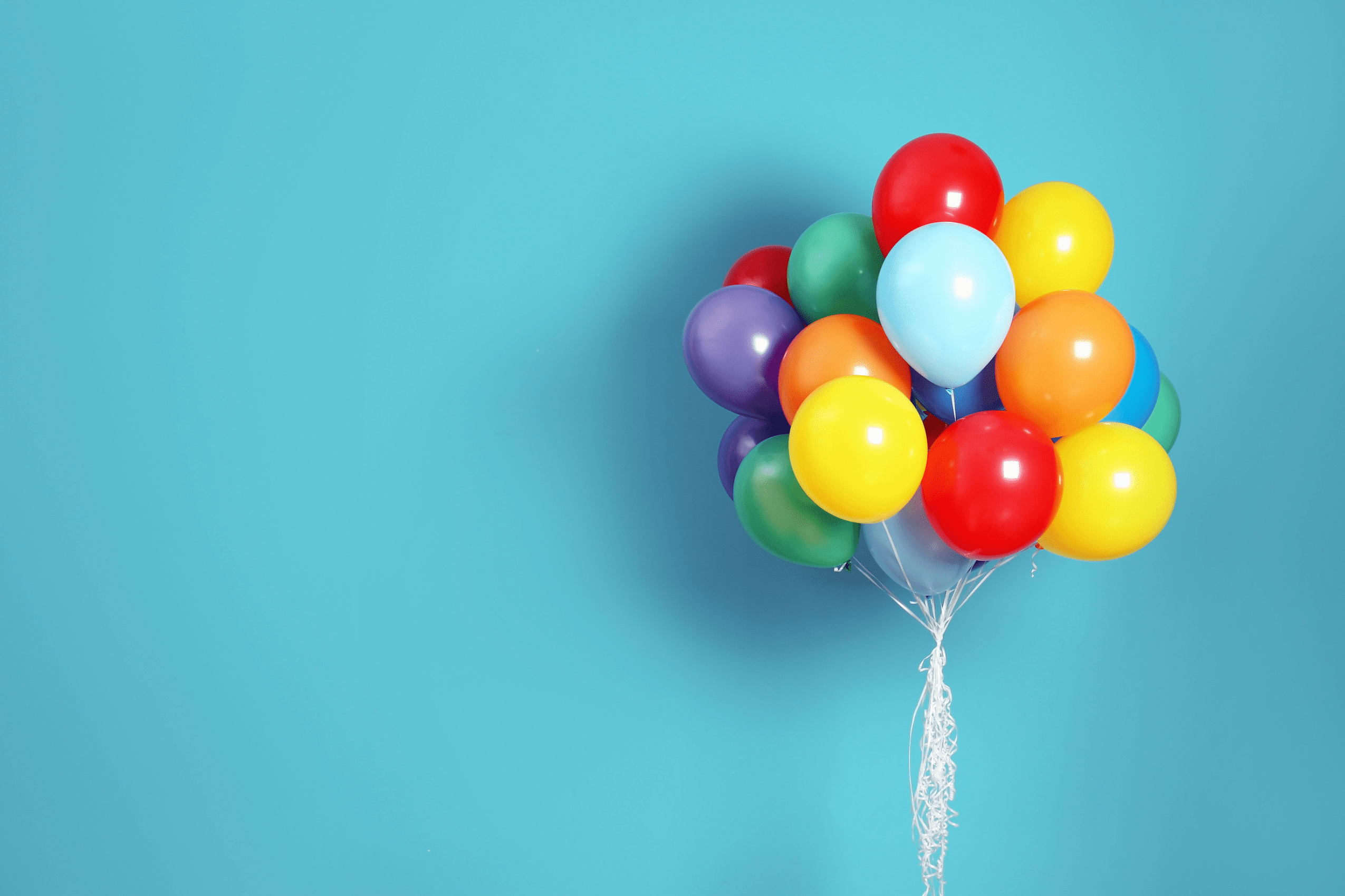 Colorful balloons on a blue background